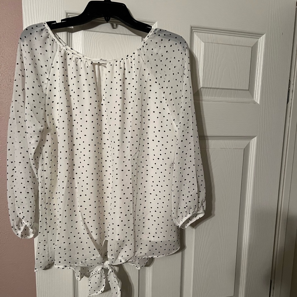 Ivory/off white blouse with black polka dots size large. Brand new but no tags.